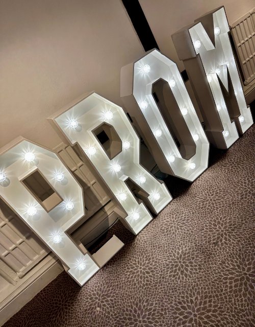 1 Light-up LOVE letters beside a white LED starlit dancefloor at a wedding venue