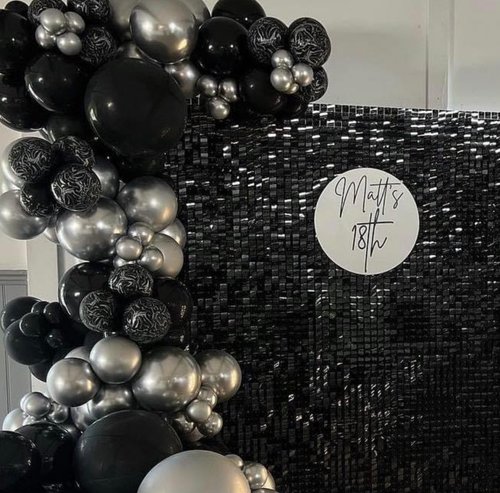 1 Black and silver balloon garland with a black sequin backdrop for Matt's 18th birthday