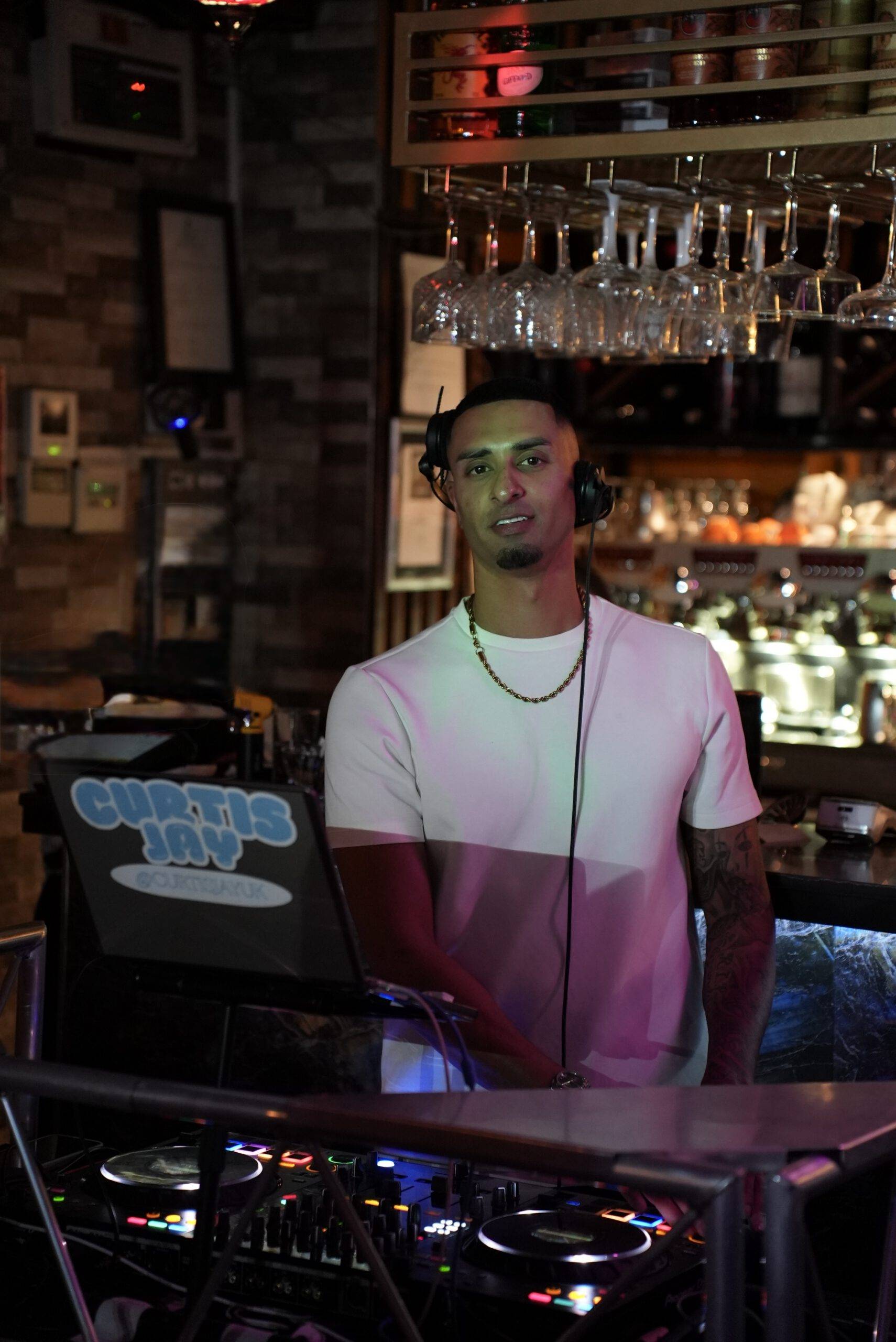 IMG_5146 London Event DJs Curtis Jay behind the decks at a bar event